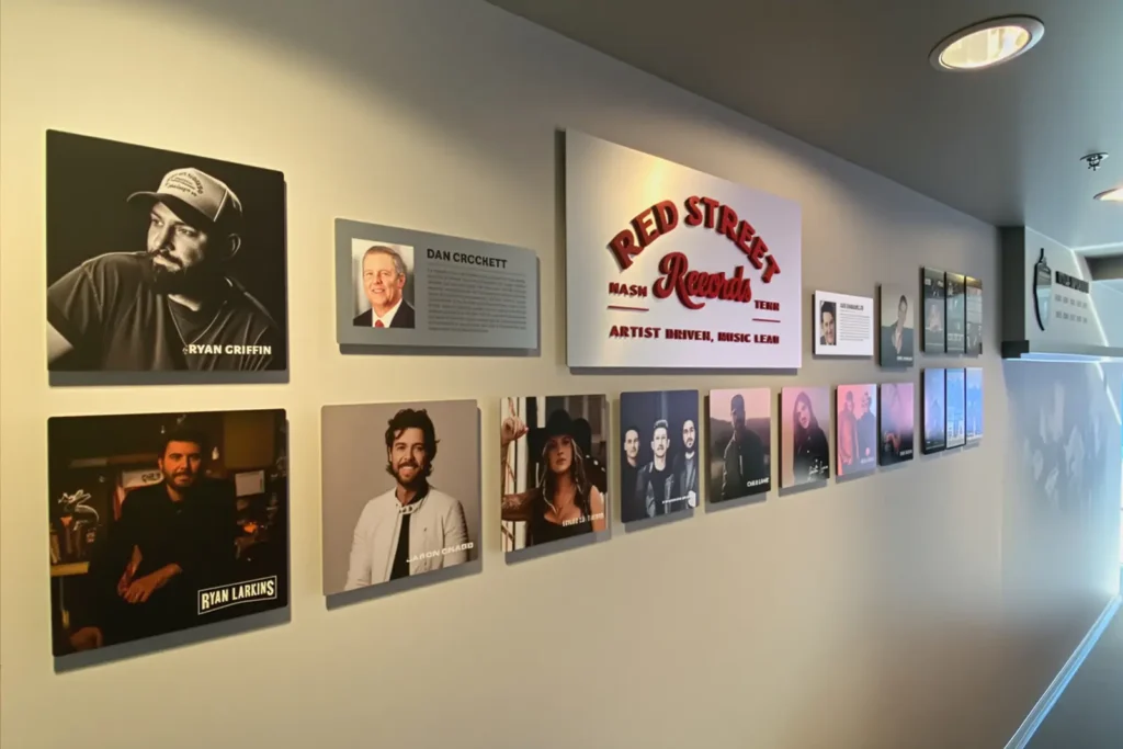 Photo of signage inside the Crockett Foundation Nissan Stadium Titans suite featuring a wall with Red Street Records